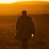 A person is walking toward the sunset, symbolizing emotional healing and the benefits of EMDR therapy.