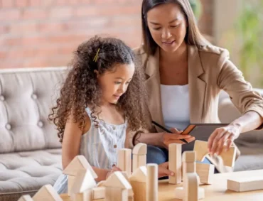 Child engaging in play therapy with a licensed therapist.