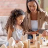 Child engaging in play therapy with a licensed therapist.