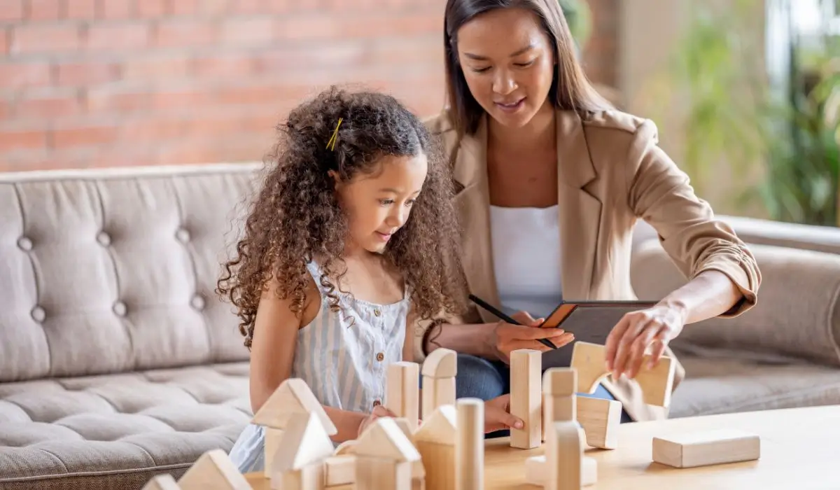 Child engaging in play therapy with a licensed therapist.